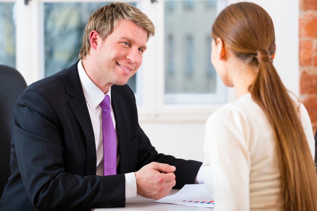 Lawyer and client in office